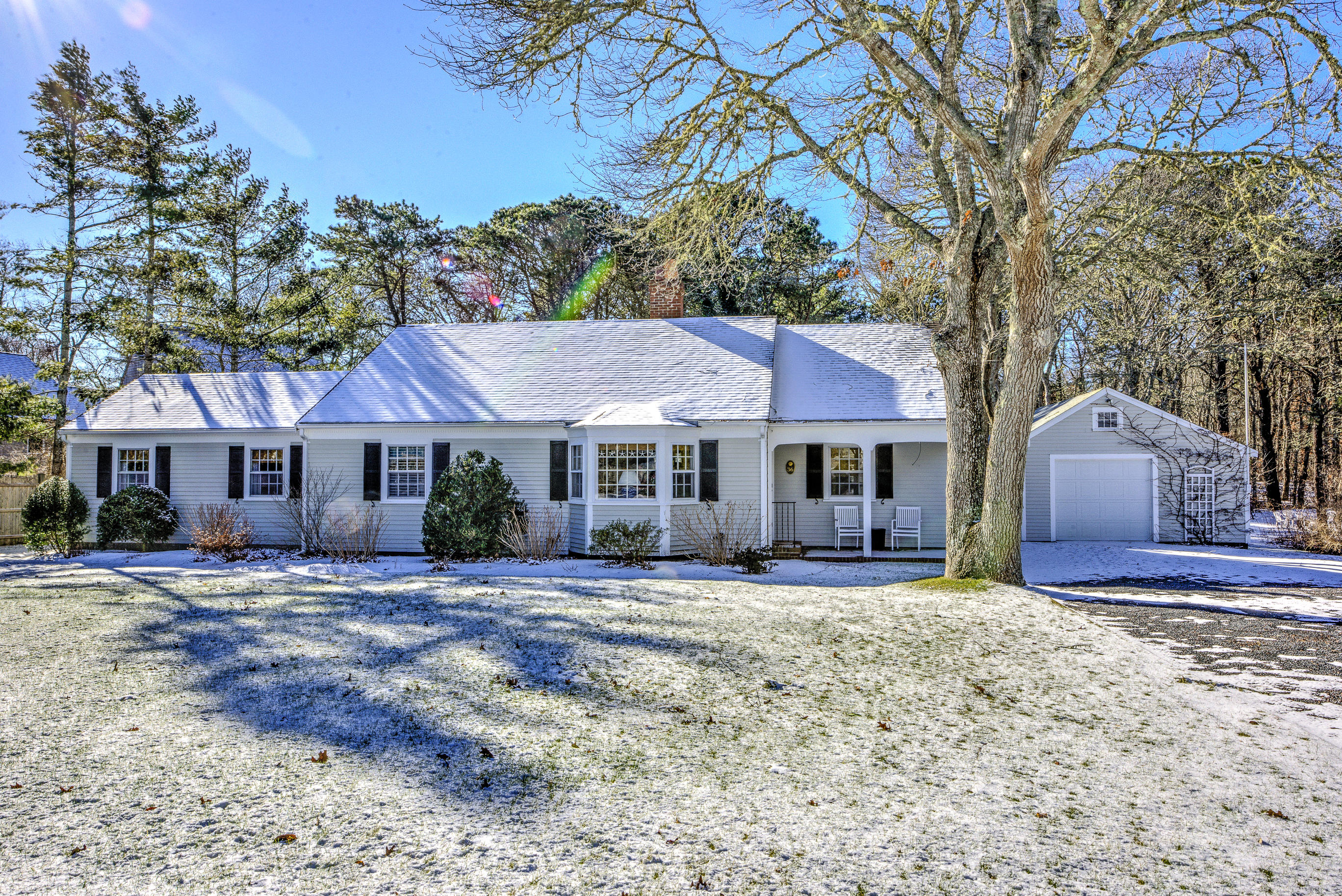 36 Deep Hole Road Harwich Port, MA 02646 - Photo 5 of 34 a front view of a house with a yard