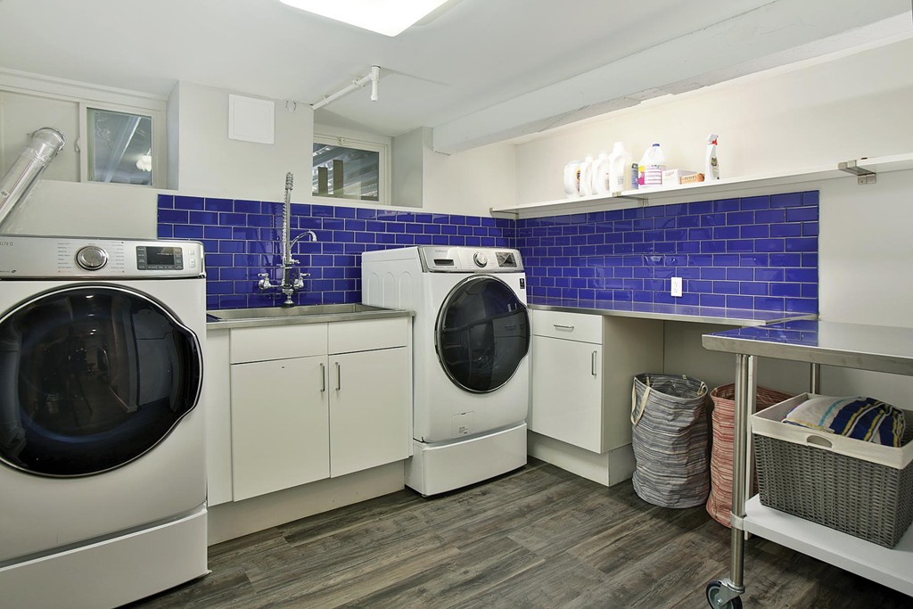 21 Salisbury Road Brookline, MA 02445 - Photo 9 of 12 a utility room with dryer and washer