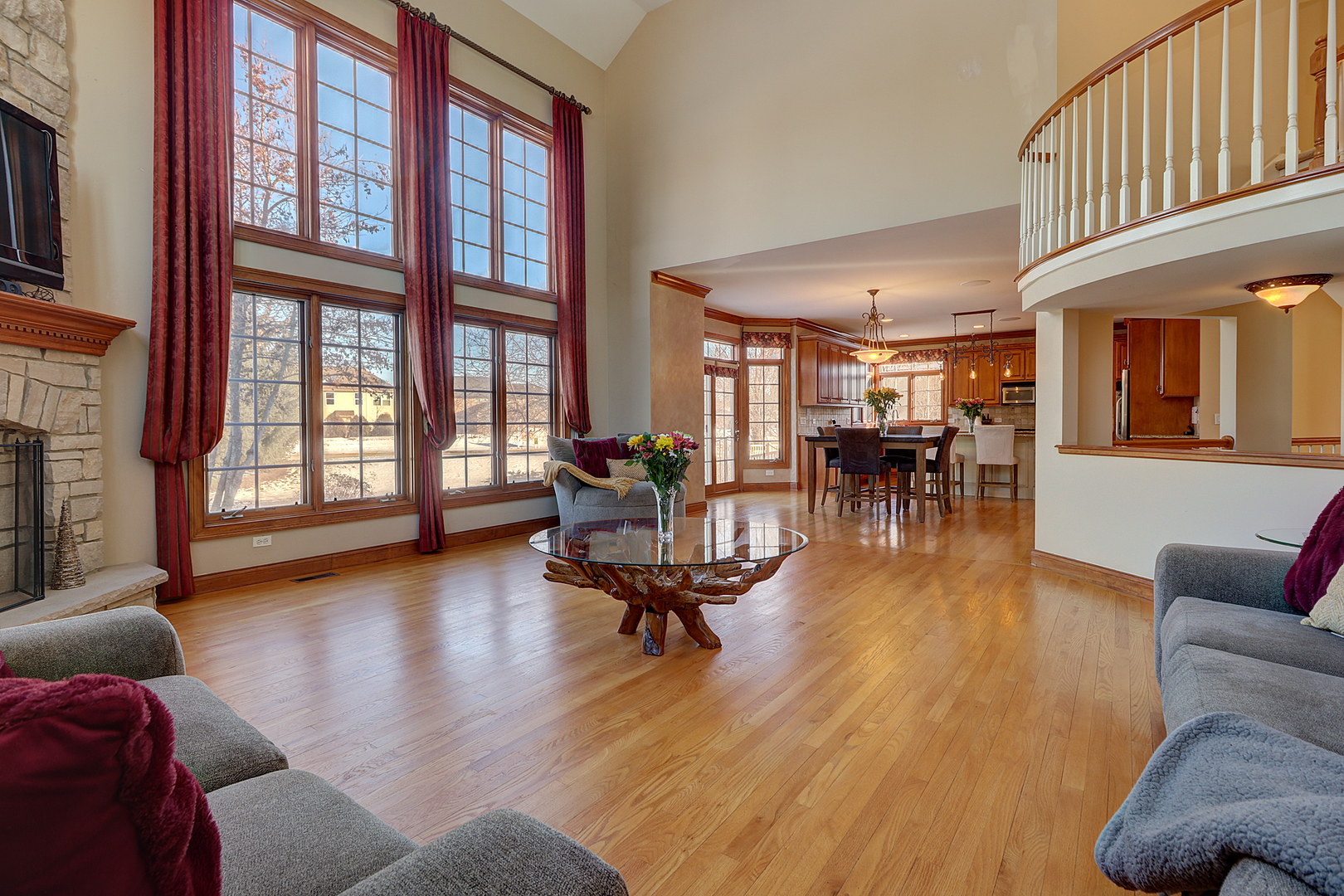 26025 Whispering Woods Circle Plainfield, IL 60585 - Photo 16 of 43 a living room with furniture window and wooden floor