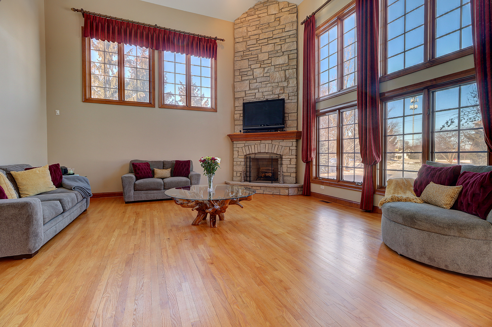 26025 Whispering Woods Circle Plainfield, IL 60585 - Photo 17 of 43 a living room with furniture and a fireplace