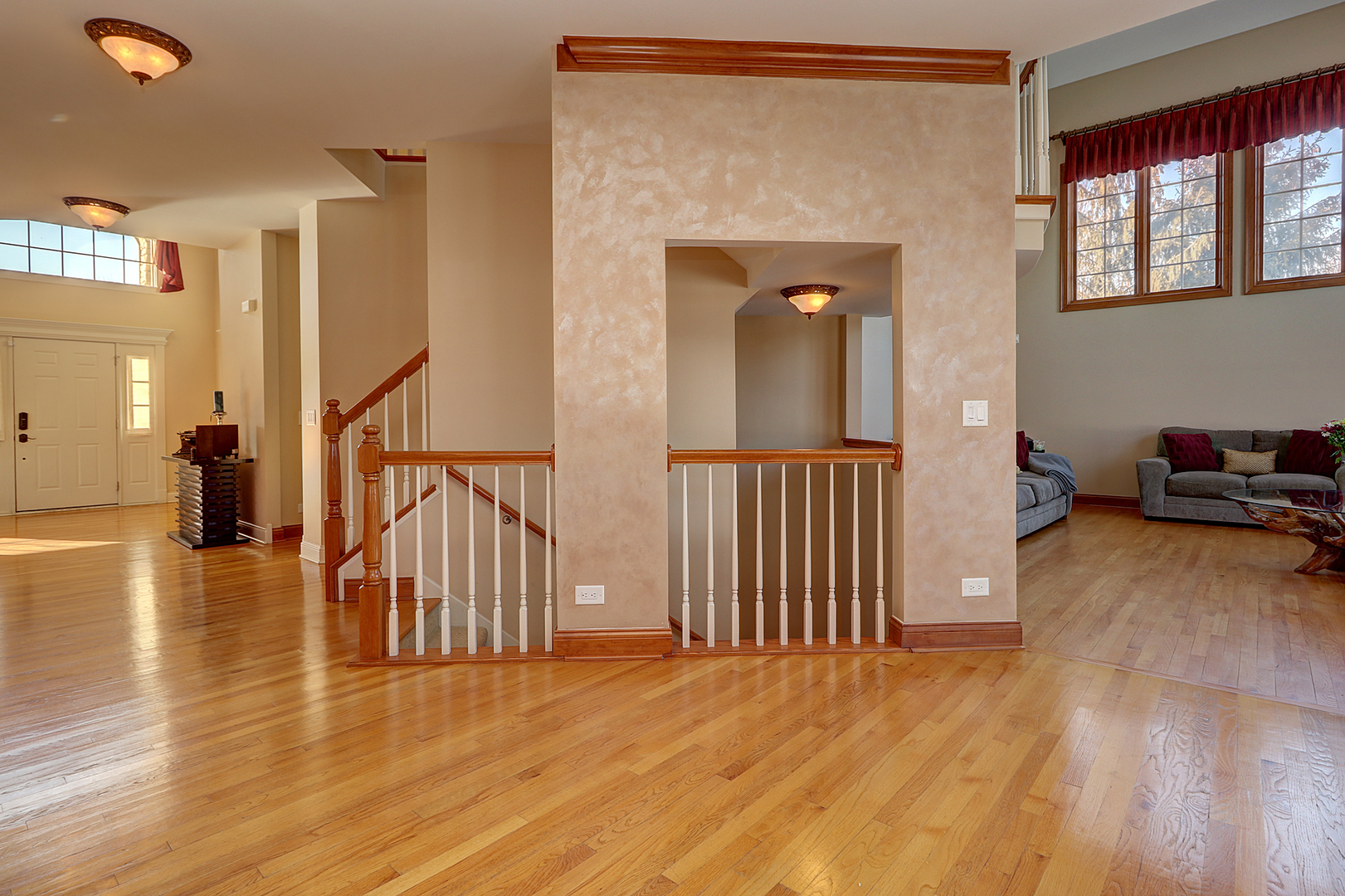 26025 Whispering Woods Circle Plainfield, IL 60585 - Photo 18 of 43 a view of a room with wooden floor and stairs