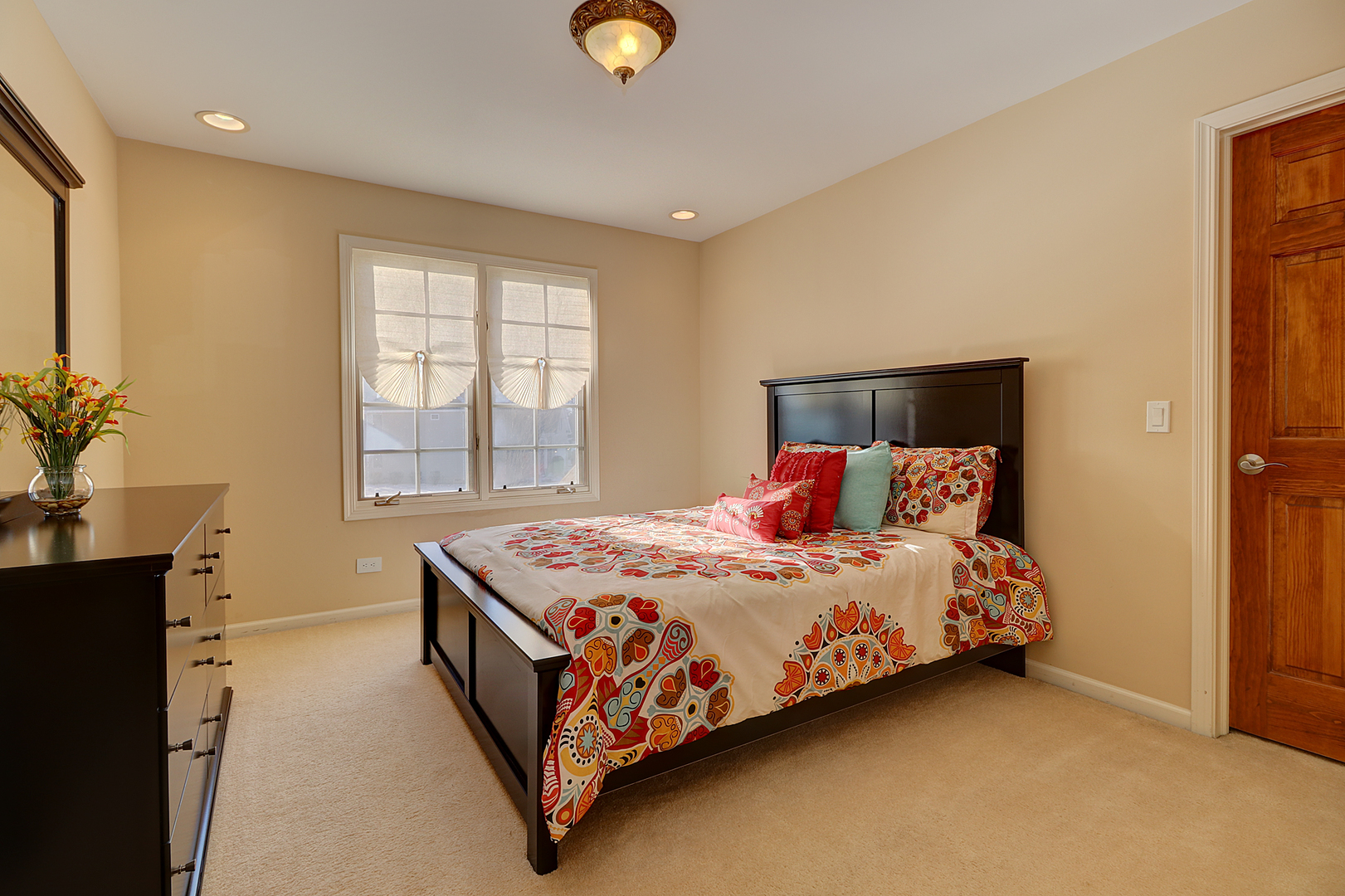 26025 Whispering Woods Circle Plainfield, IL 60585 - Photo 24 of 43 a bedroom with a bed lamp and a window