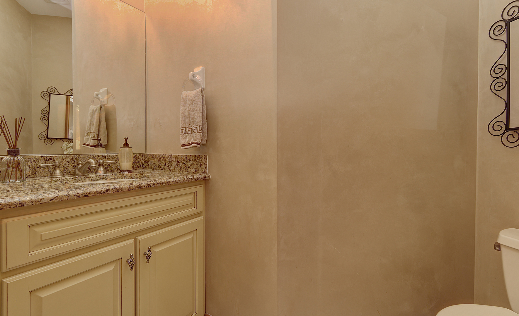 26025 Whispering Woods Circle Plainfield, IL 60585 - Photo 35 of 43 a bathroom with a granite countertop sink and a mirror