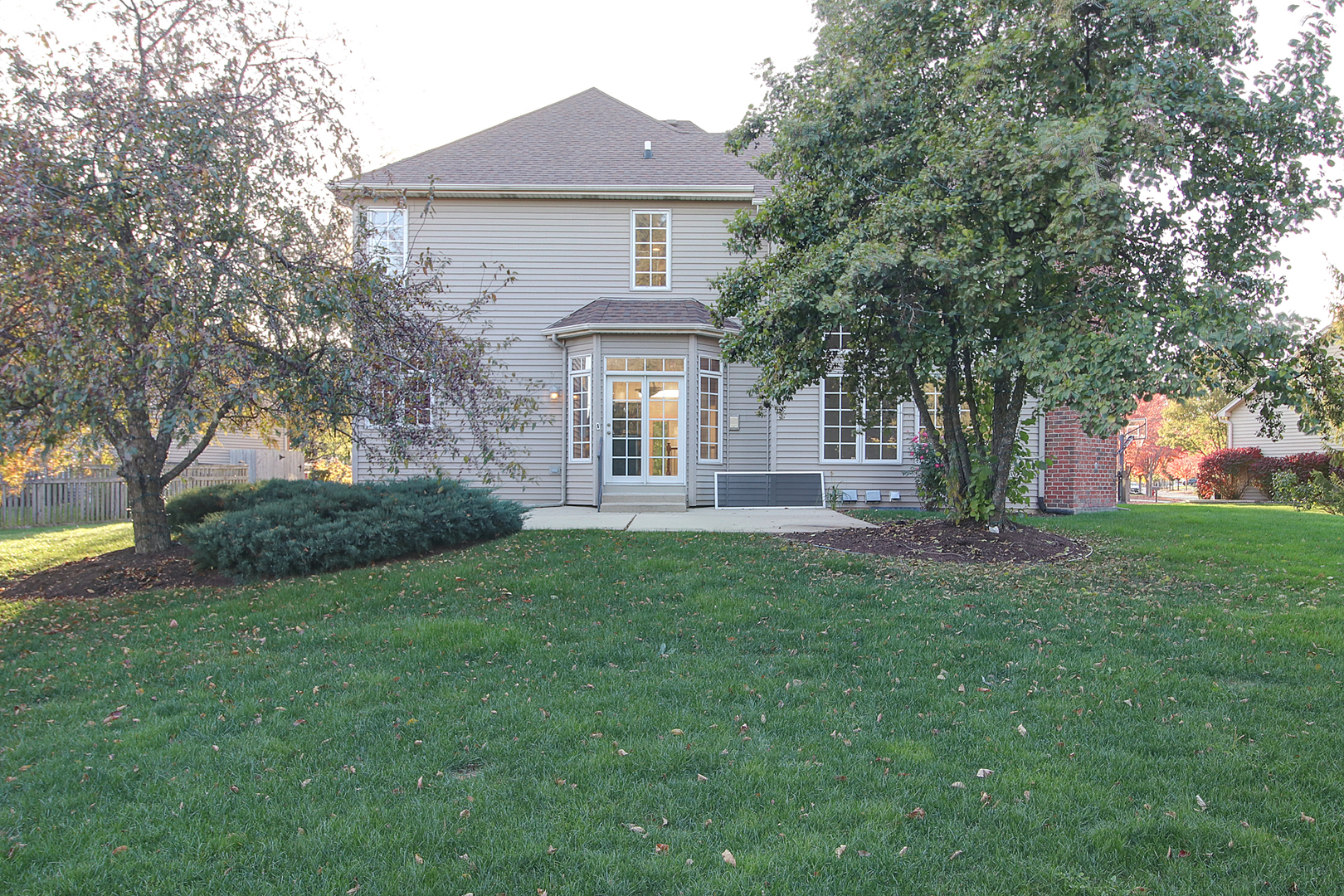 26025 Whispering Woods Circle Plainfield, IL 60585 - Photo 41 of 43 a view of a house with yard and a tree
