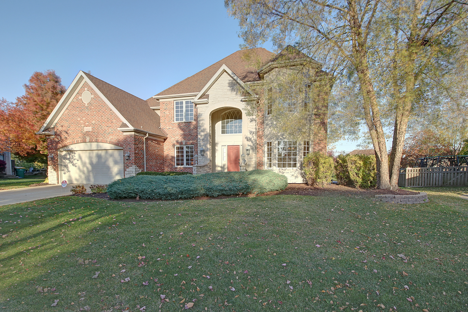 26025 Whispering Woods Circle Plainfield, IL 60585 - Photo 43 of 43 a front view of a house with a yard