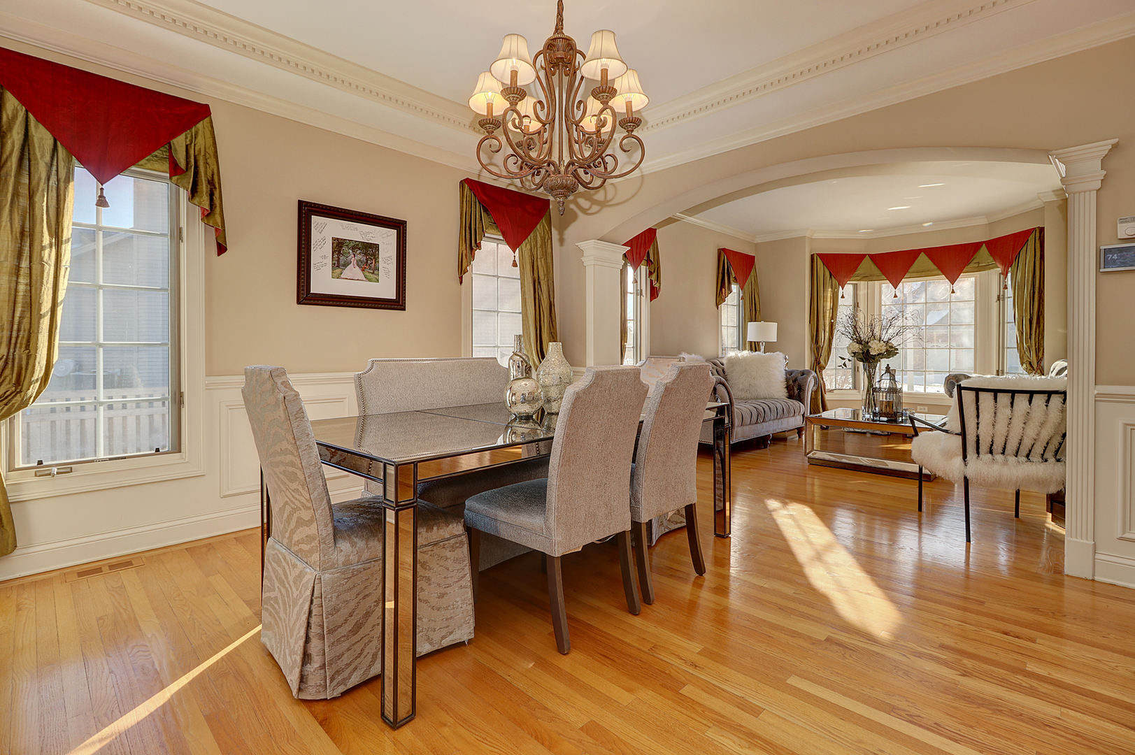 26025 Whispering Woods Circle Plainfield, IL 60585 - Photo 6 of 43 a view of a dining room with furniture window and wooden floor