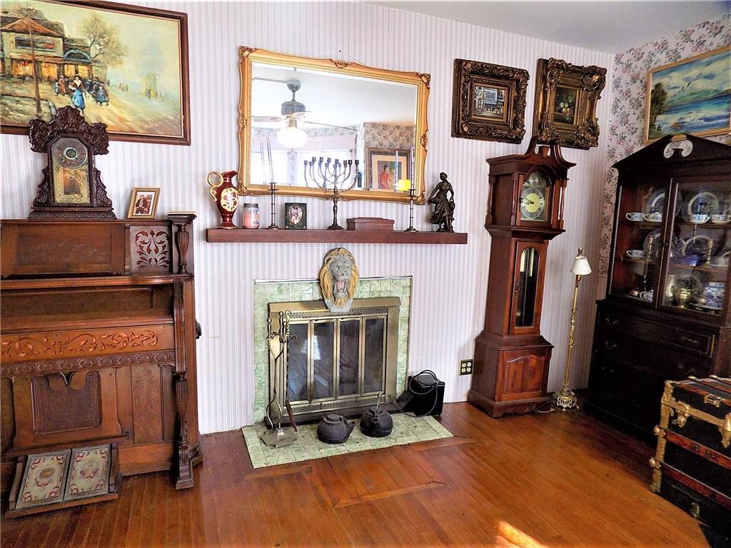 20 Maple Street Dexter, ME 04930 - Photo 15 of 35 There's a working wood fireplace.