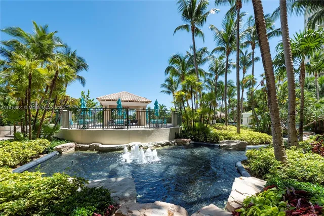 a view of swimming pool with outdoor seating