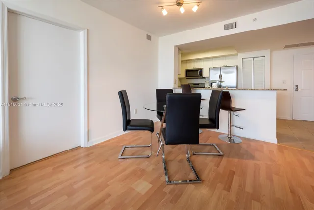 a workspace with furniture and wooden floor
