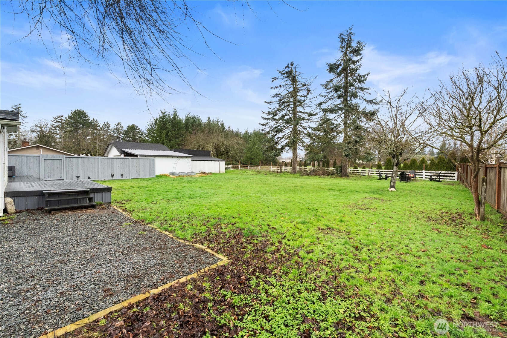 16419 92nd Street East Sumner, WA 98390 - Photo 28 of 39 a view of backyard with wooden fence