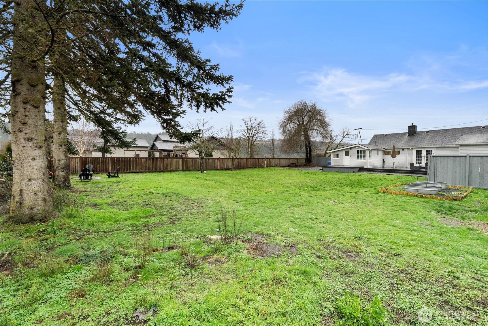16419 92nd Street East Sumner, WA 98390 - Photo 30 of 39 a view of a house with a big yard and large trees