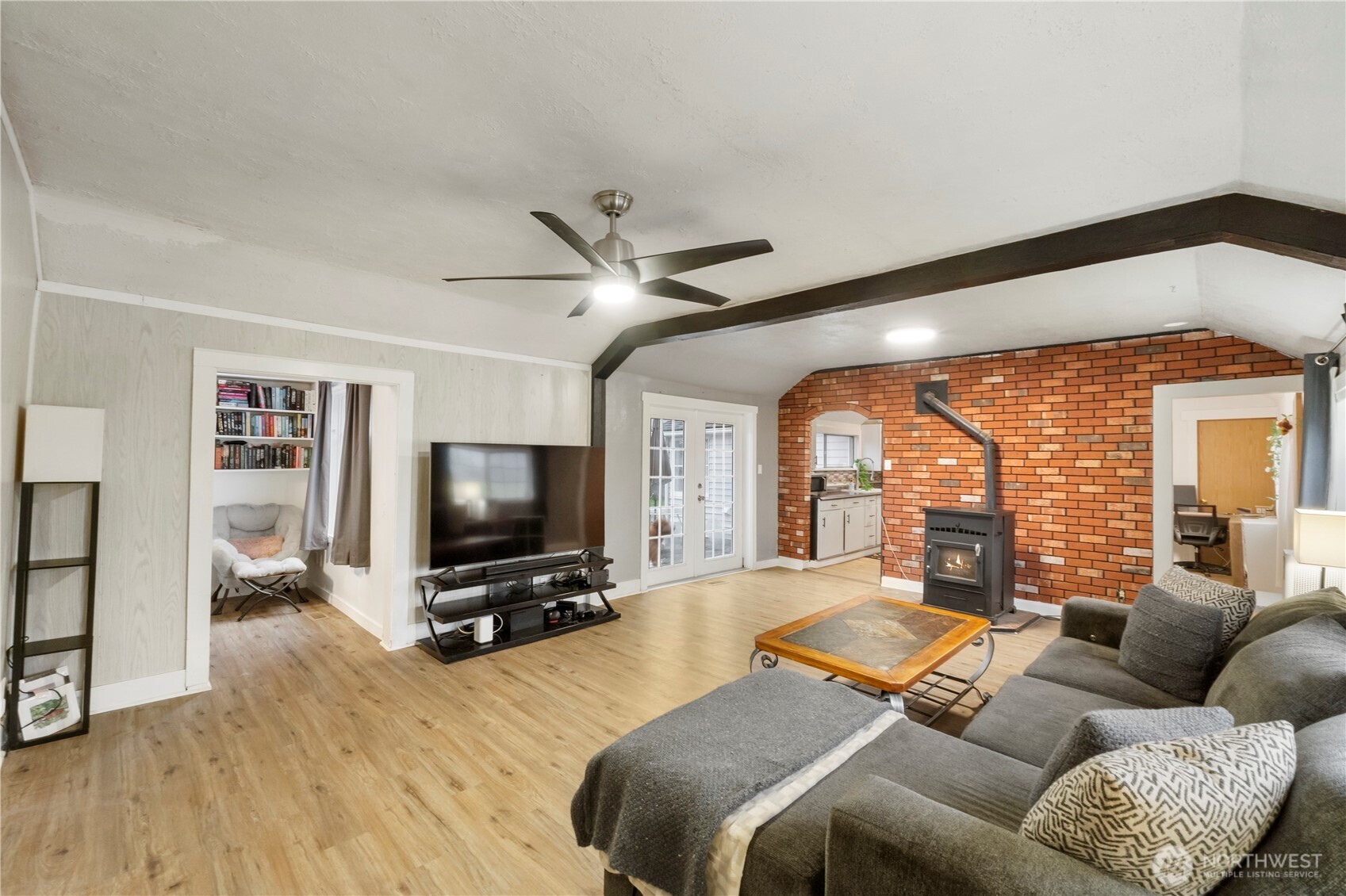 16419 92nd Street East Sumner, WA 98390 - Photo 6 of 39 a living room with furniture and a flat screen tv