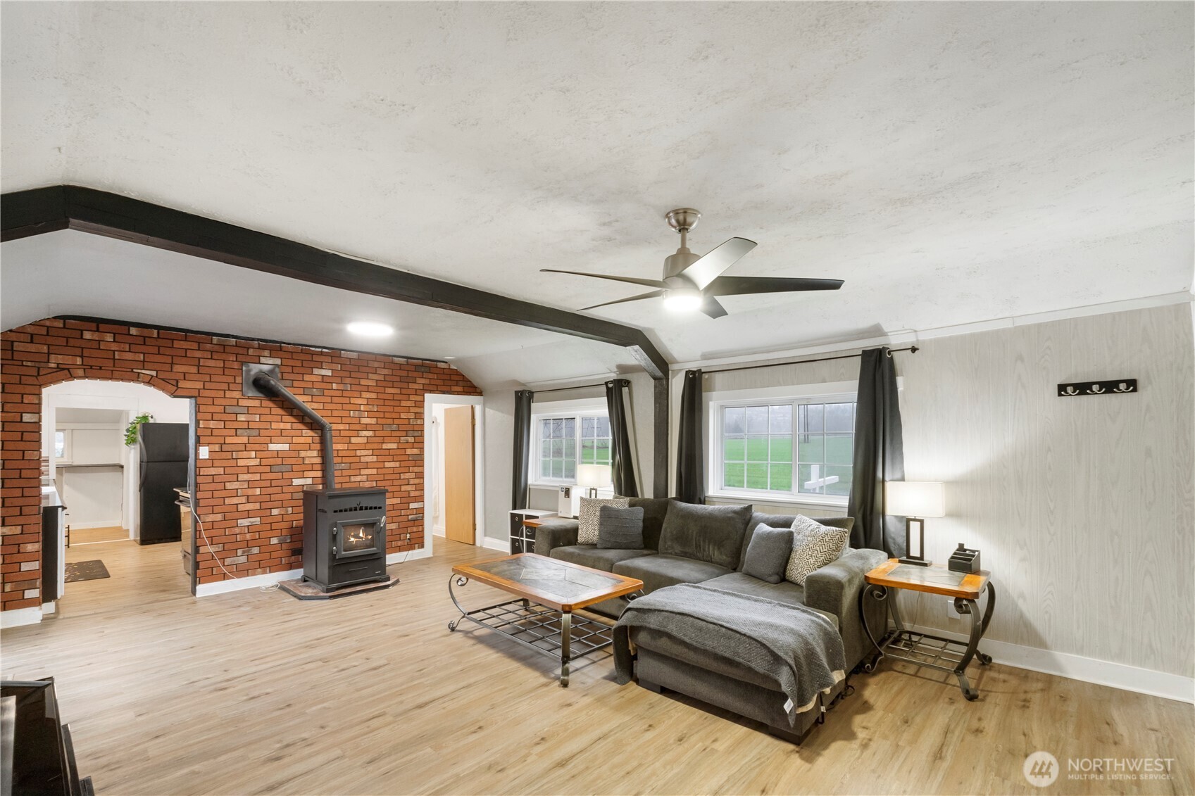 16419 92nd Street East Sumner, WA 98390 - Photo 7 of 39 a living room with furniture and a large window