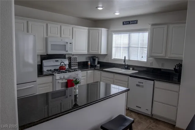 $345,000 | 10553 Pine Pointe Avenue, Unit 201, Las Vegas, NV 89144