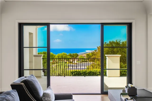 a view of a bedroom with bed and cabinet