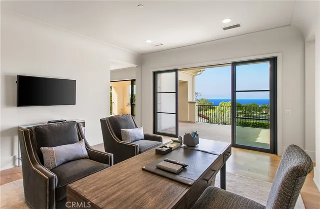 a spacious bathroom with a granite countertop sink mirror and cabinets