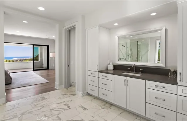 a view of city with ocean