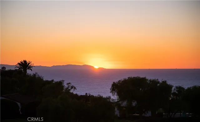 a utility room with sink dryer and washer