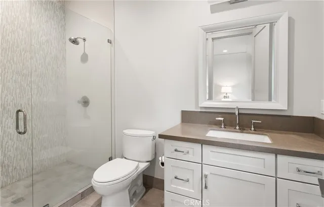 an aerial view of residential houses and outdoor space