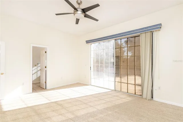 a view of a room with a large window