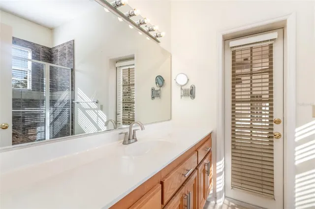 a bathroom with a bathtub and a sink