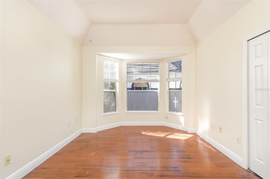 9217 Ridge Pine Trail Orlando, FL 32819 - Photo 25 of 39 a view of an empty room with a window
