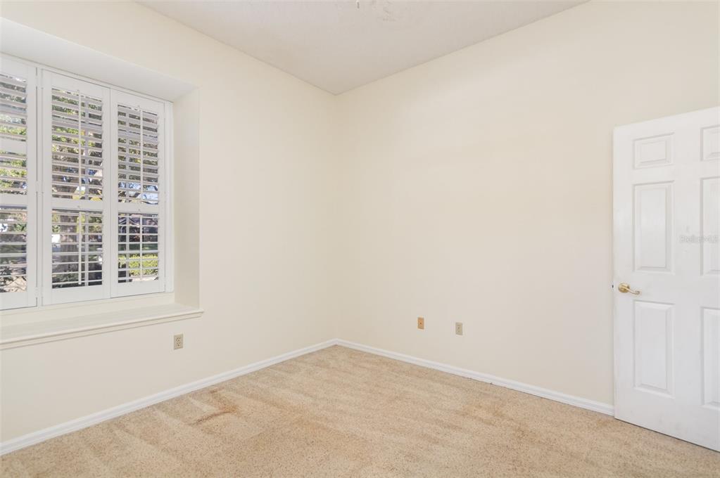 9217 Ridge Pine Trail Orlando, FL 32819 - Photo 27 of 37 an empty room with a window