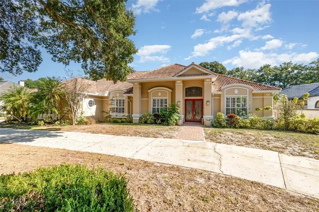 front view of a house with a yard