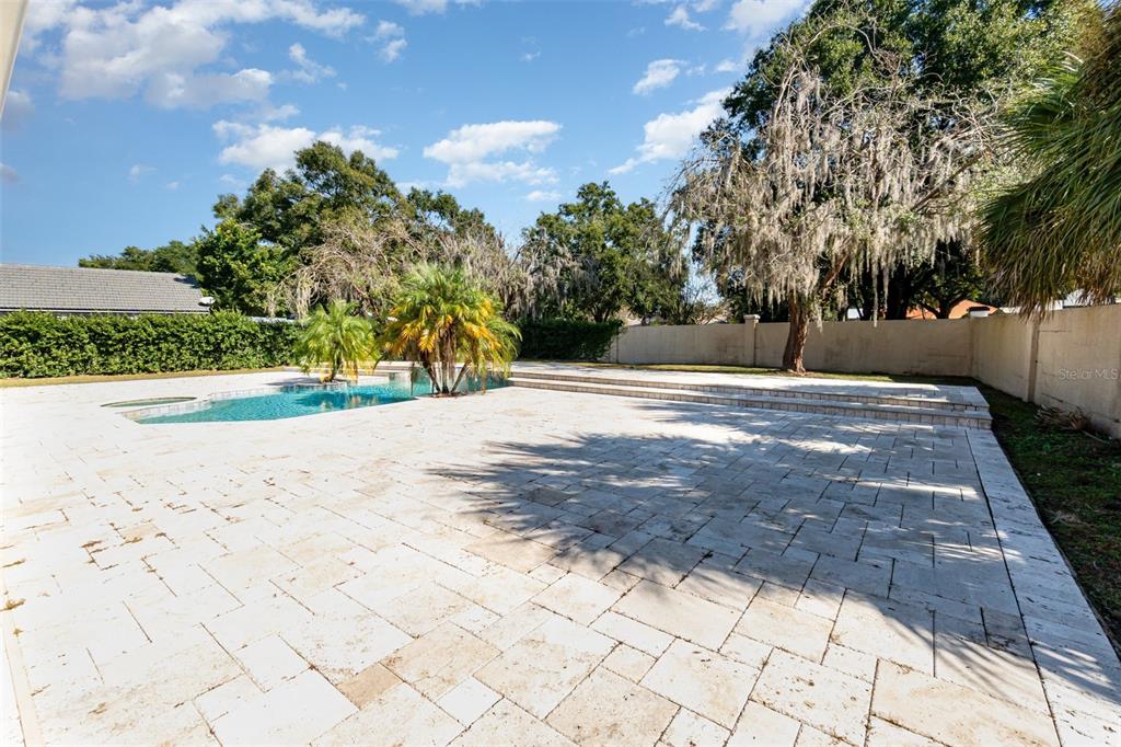 9217 Ridge Pine Trail Orlando, FL 32819 - Photo 34 of 37 a view of a backyard of the house