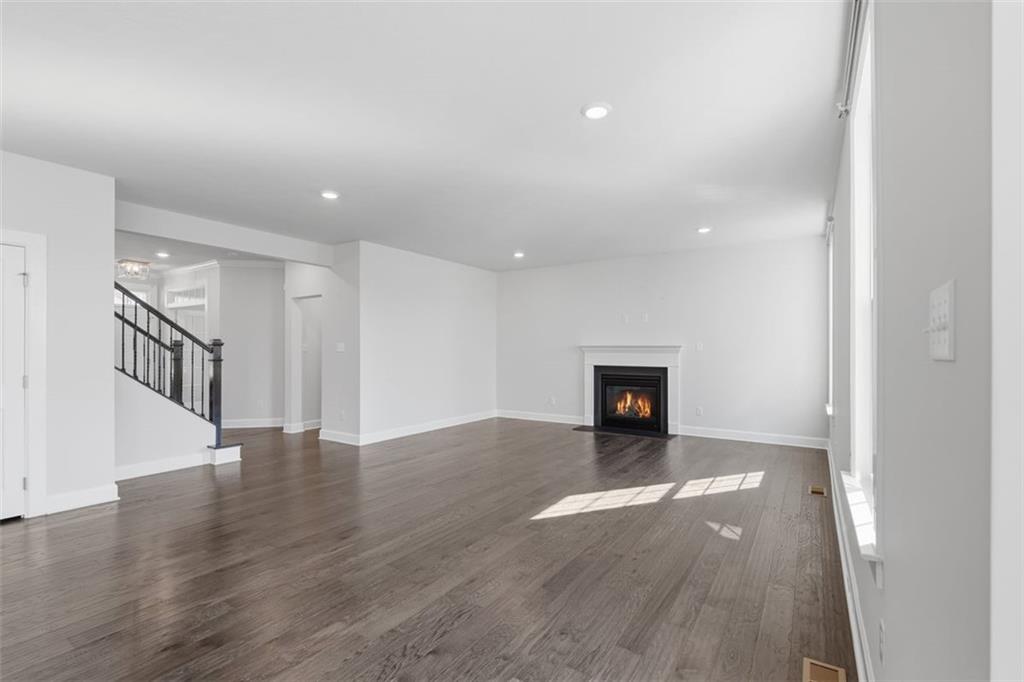 641 Tullamore Trail Mars, PA 16046 - Photo 13 of 47 a view of an empty room and wooden floor