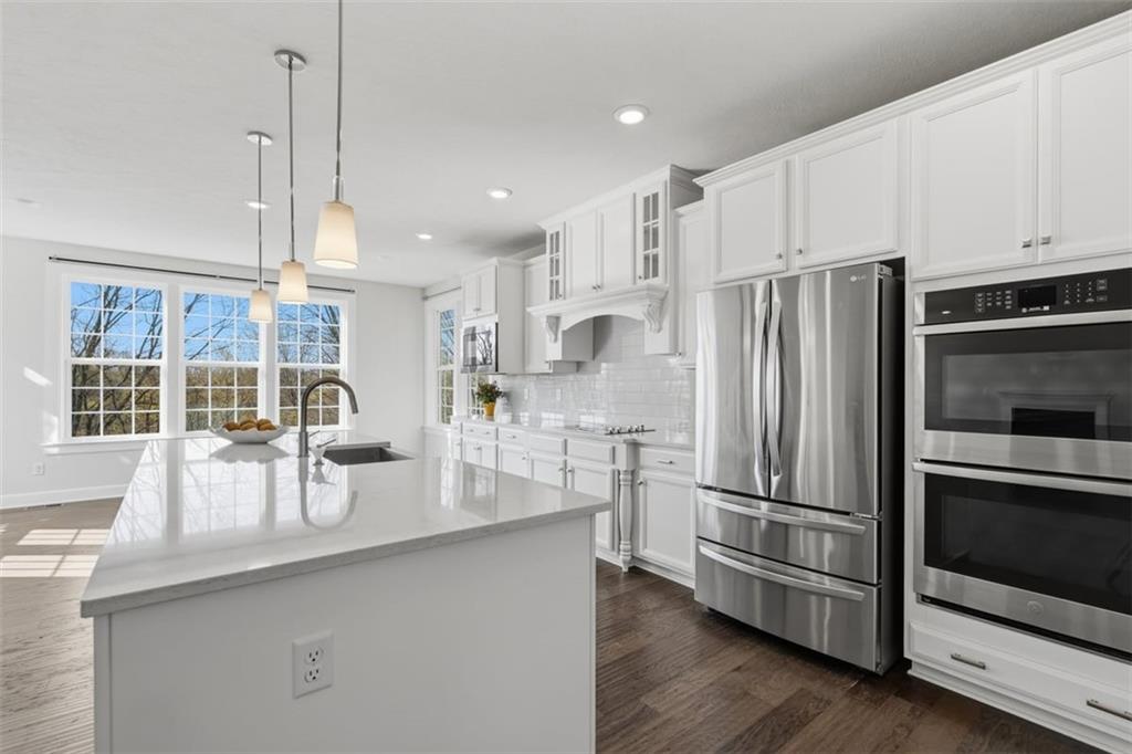 641 Tullamore Trail Mars, PA 16046 - Photo 19 of 47 a kitchen with stainless steel appliances a refrigerator sink and microwave