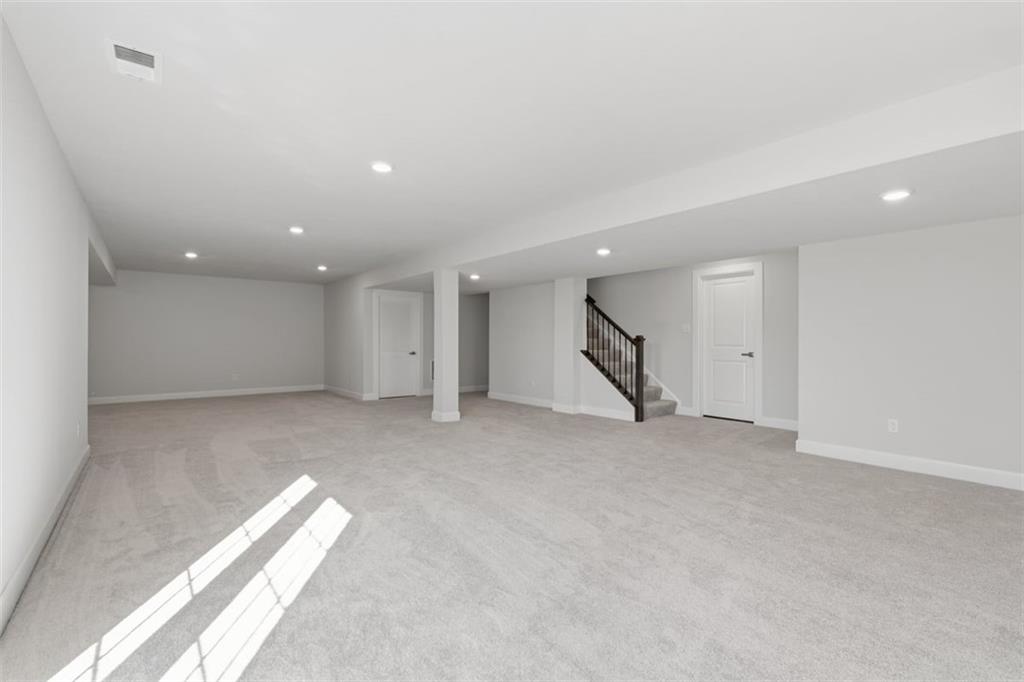641 Tullamore Trail Mars, PA 16046 - Photo 37 of 47 an empty room with a window and a projector