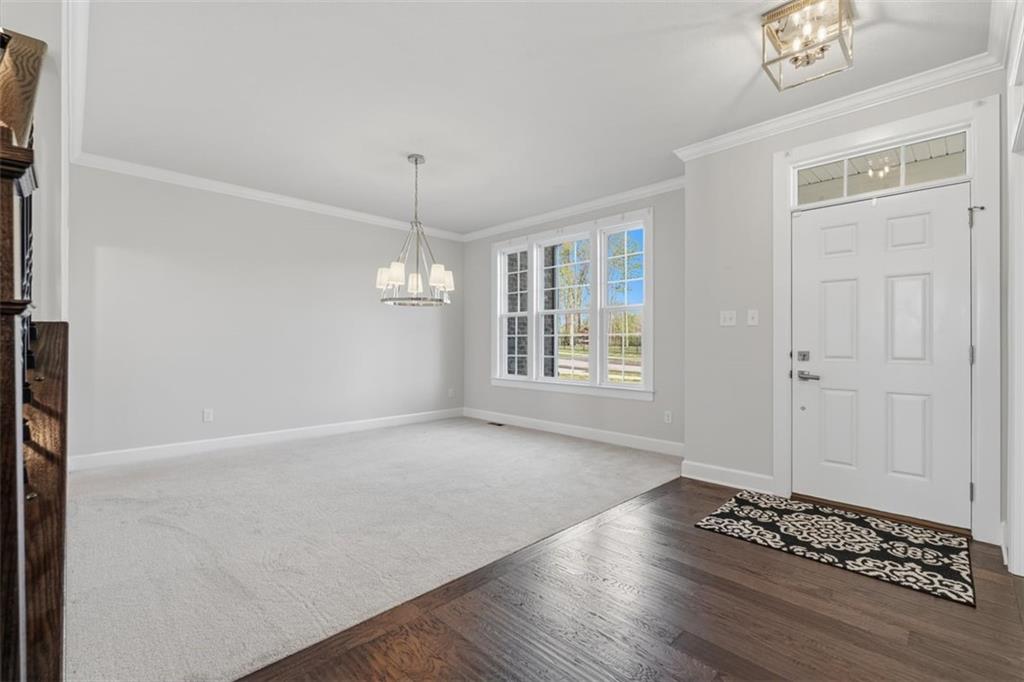 641 Tullamore Trail Mars, PA 16046 - Photo 6 of 47 wooden floor in an empty room with a window