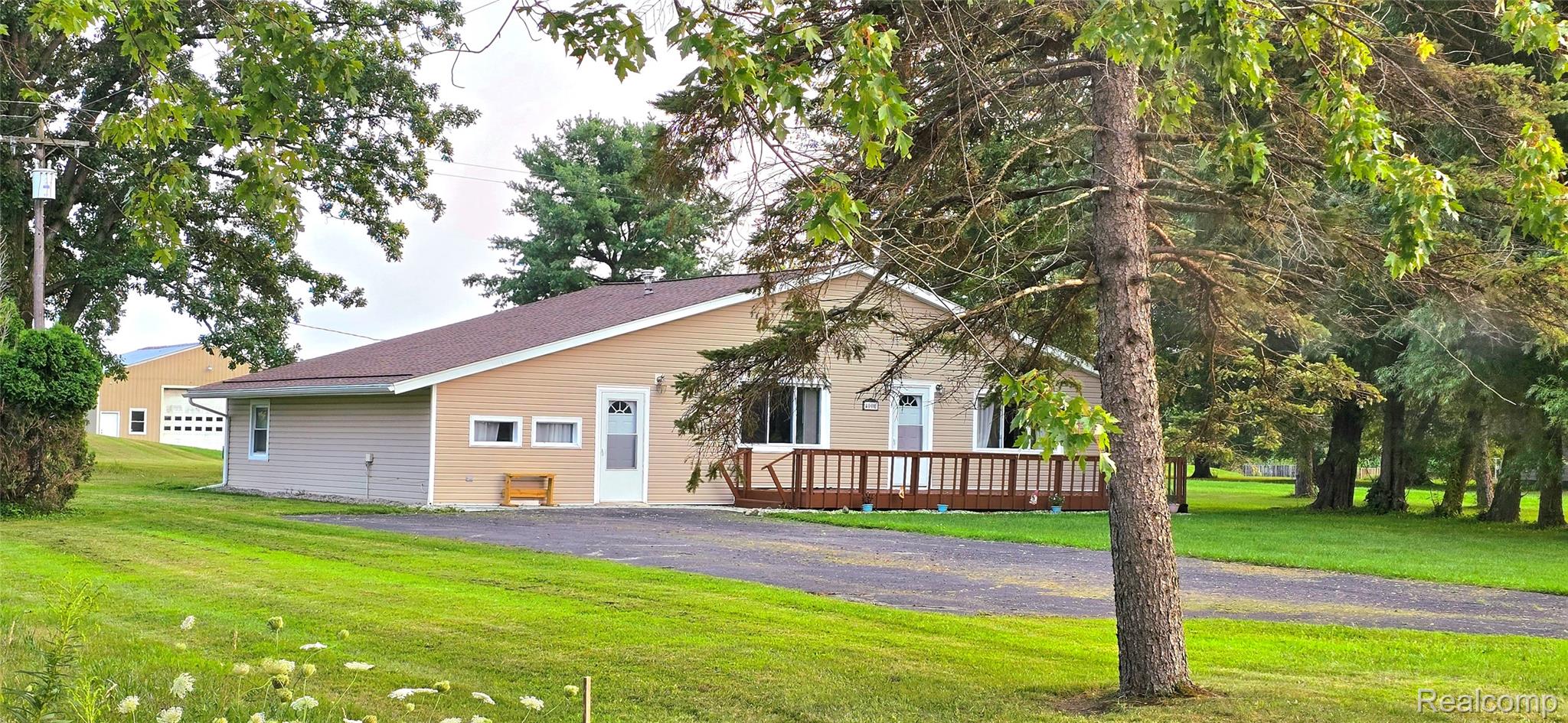 4000 East Frost Road Webberville, MI 48892 - Photo 35 of 36 Front of House with Barn in Background
