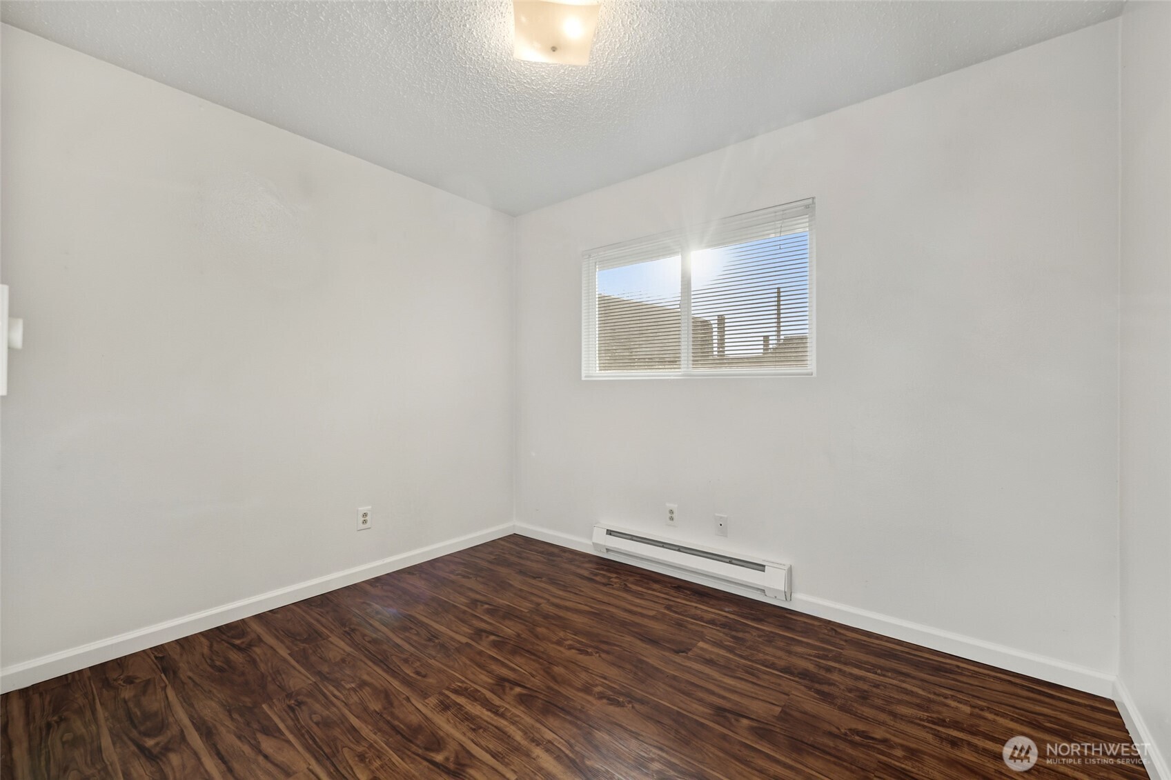 418 North 13th Street Elma, WA 98541 - Photo 16 of 37 wooden floor in an empty room