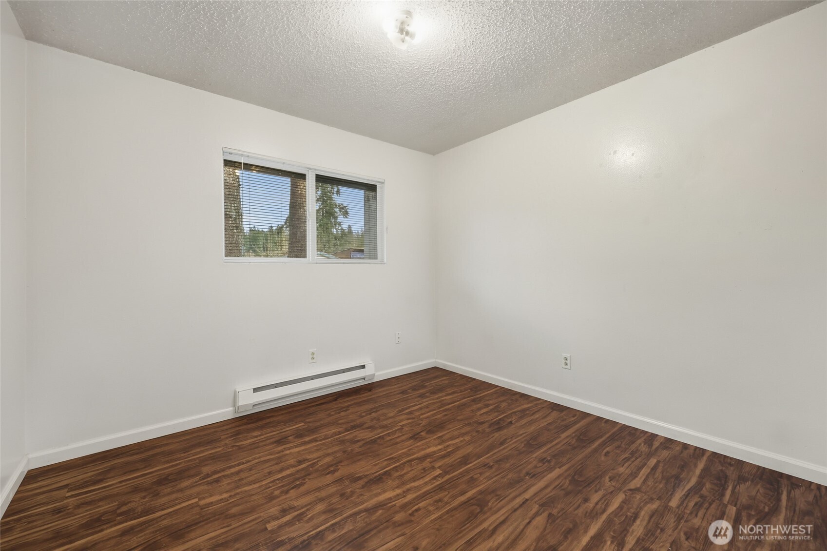 418 North 13th Street Elma, WA 98541 - Photo 18 of 37 wooden floor in an empty room