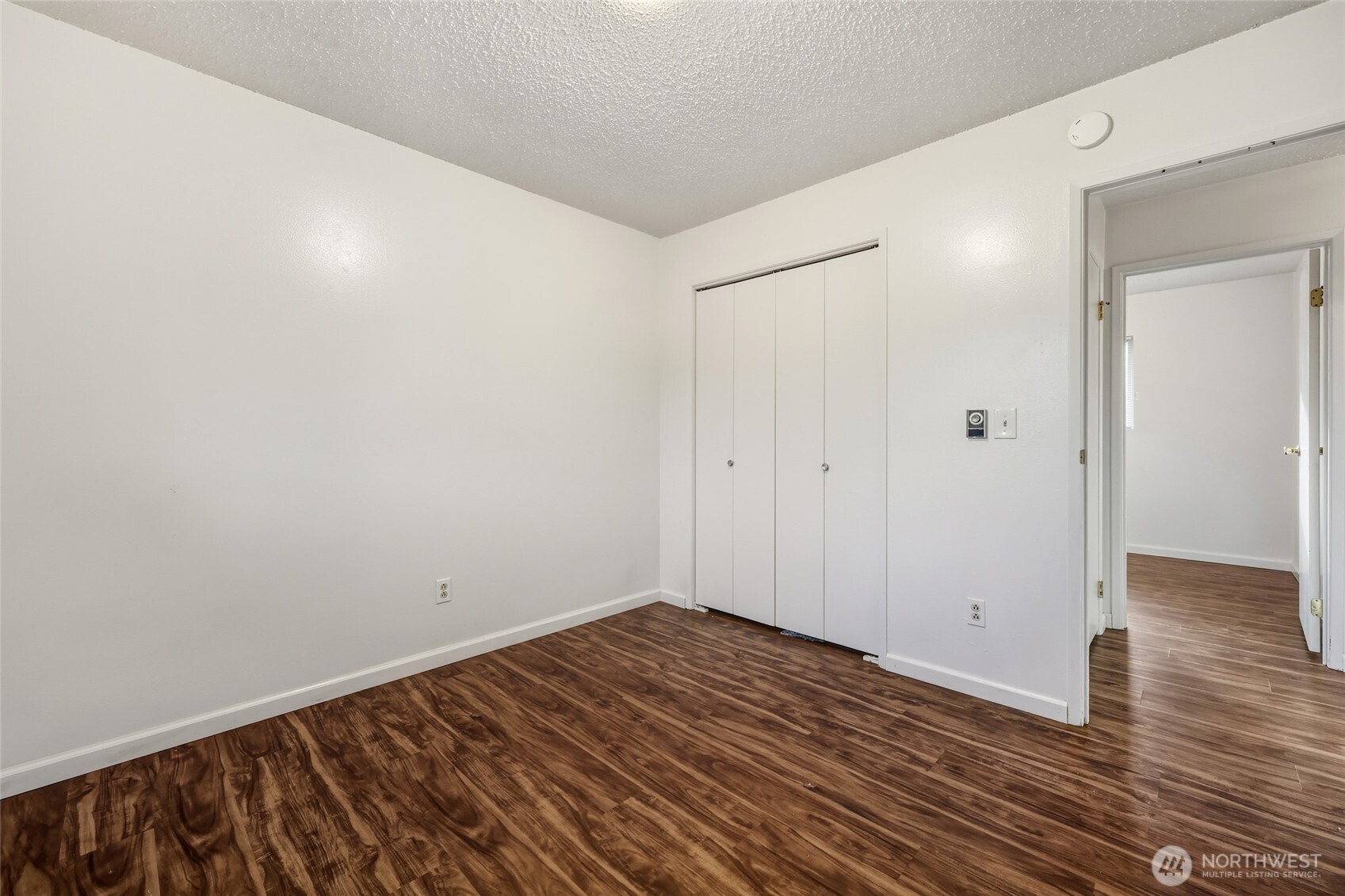 418 North 13th Street Elma, WA 98541 - Photo 18 of 34 a view of a room with wooden floor