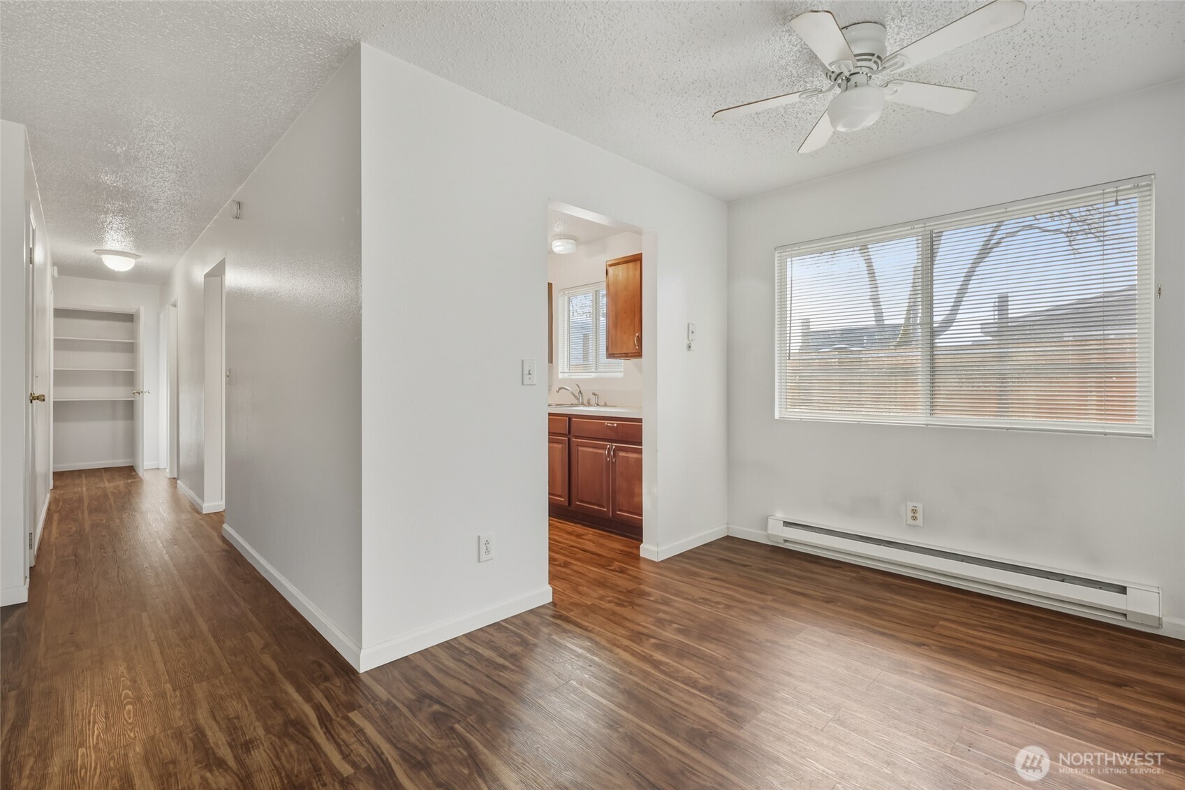 418 North 13th Street Elma, WA 98541 - Photo 20 of 37 wooden floor in an empty room with a window