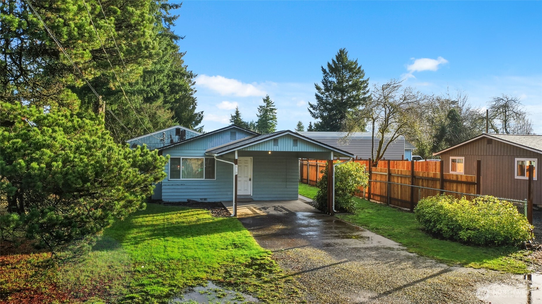 418 North 13th Street Elma, WA 98541 - Photo 26 of 34 a front view of a house with garden