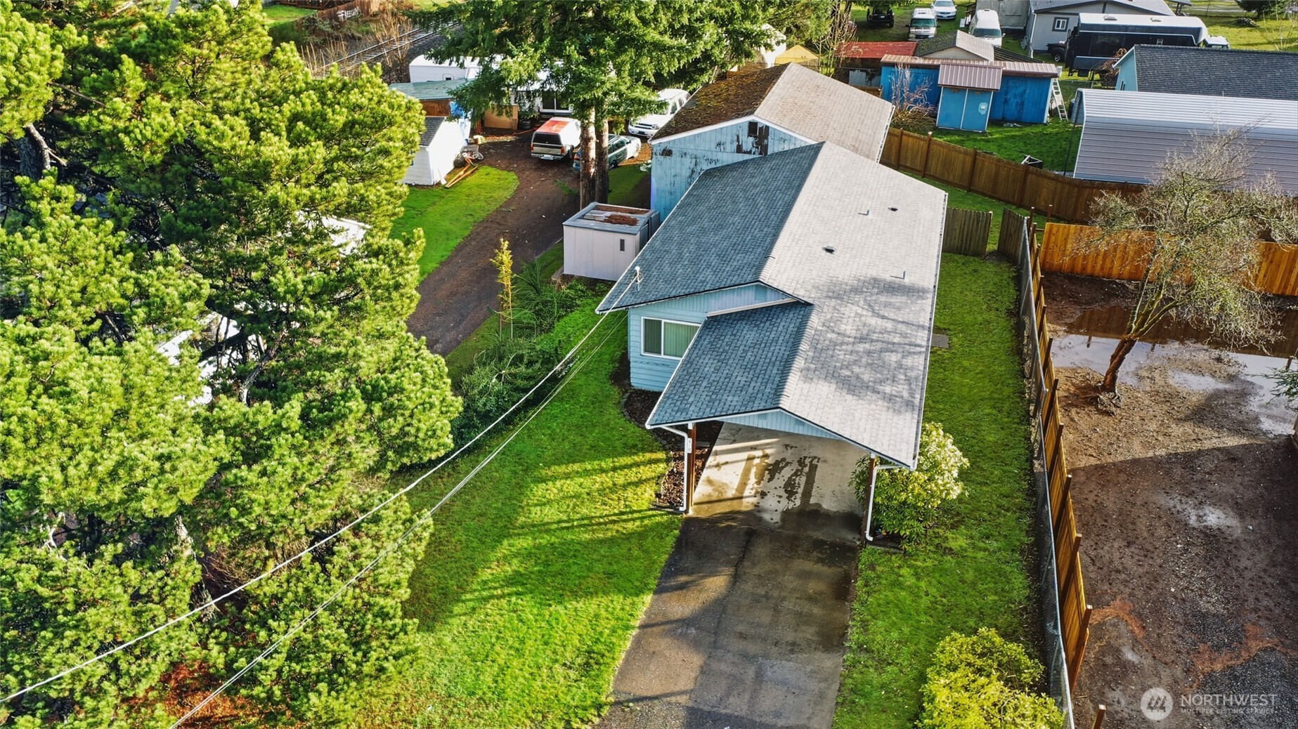 418 North 13th Street Elma, WA 98541 - Photo 31 of 37 an aerial view of a house with garden space and street view