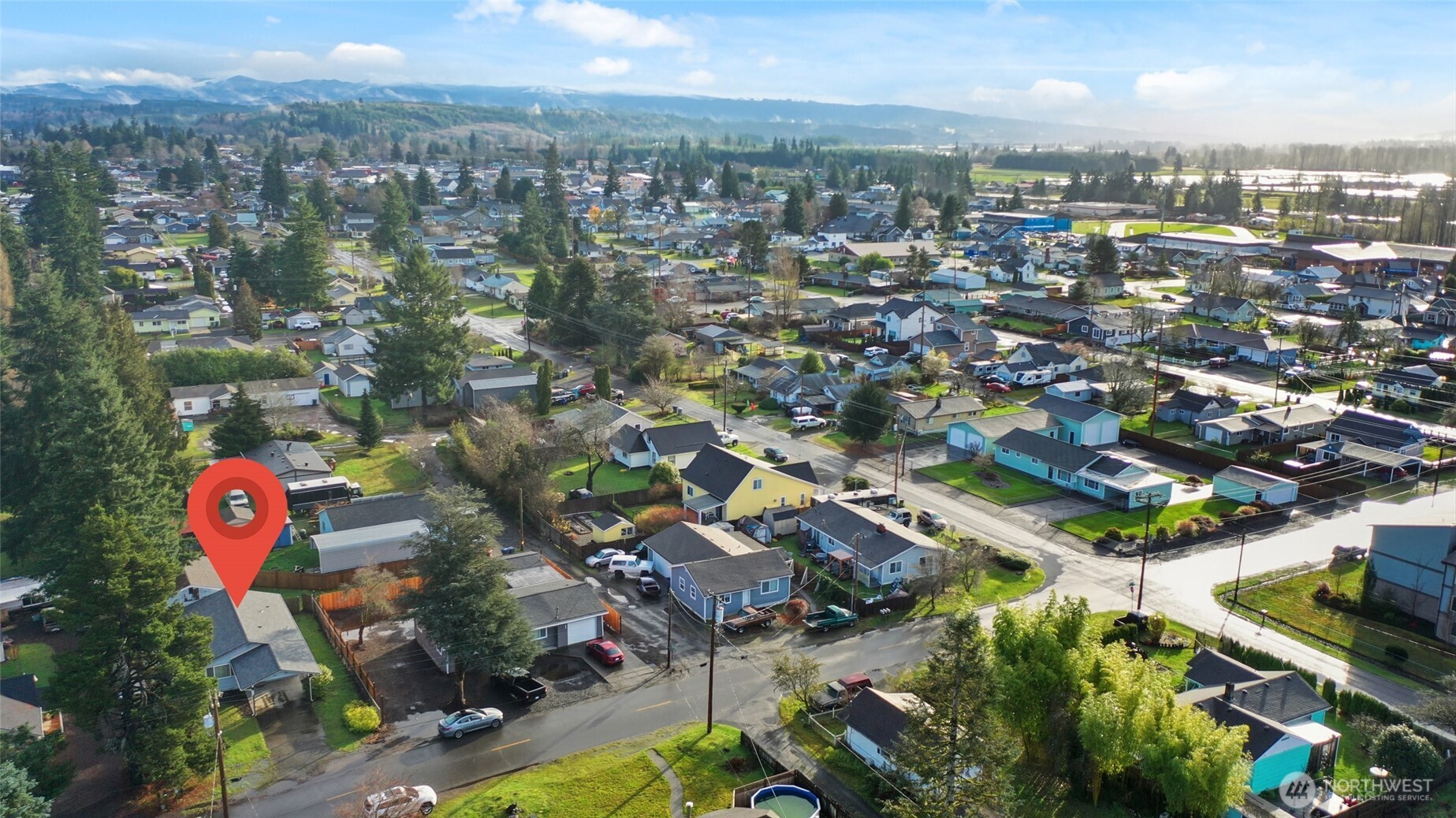 418 North 13th Street Elma, WA 98541 - Photo 36 of 37 an aerial view of residential houses with outdoor space