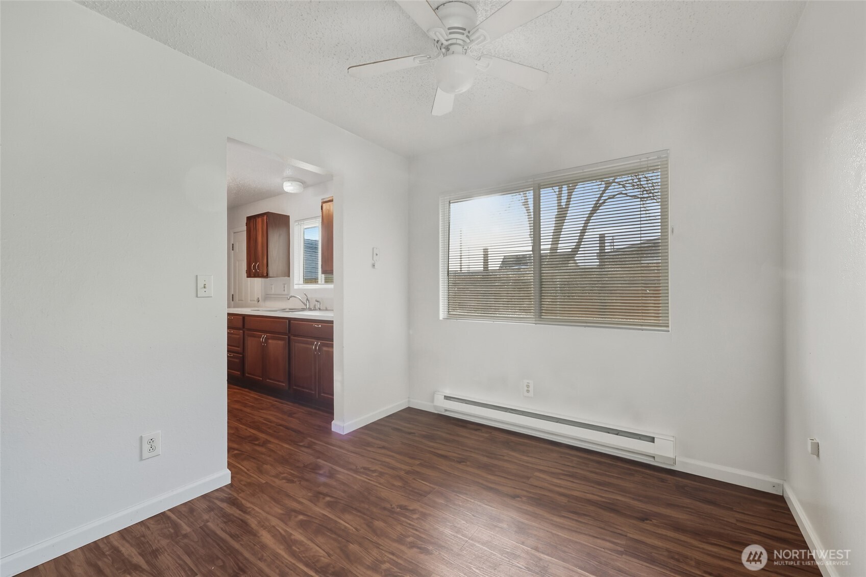 418 North 13th Street Elma, WA 98541 - Photo 5 of 37 wooden floor in an empty room with a window