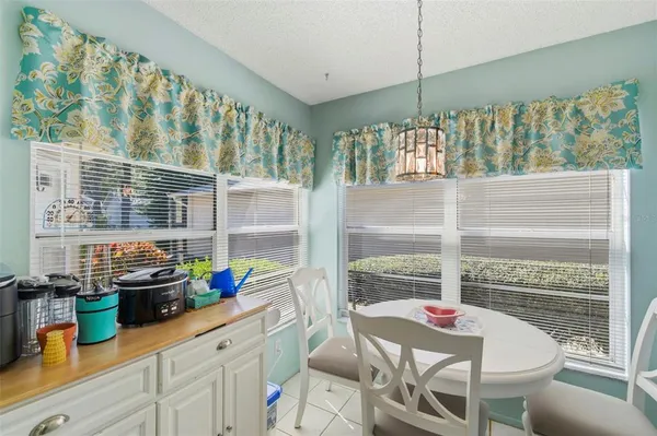a bathroom with a sink vanity and a mirror