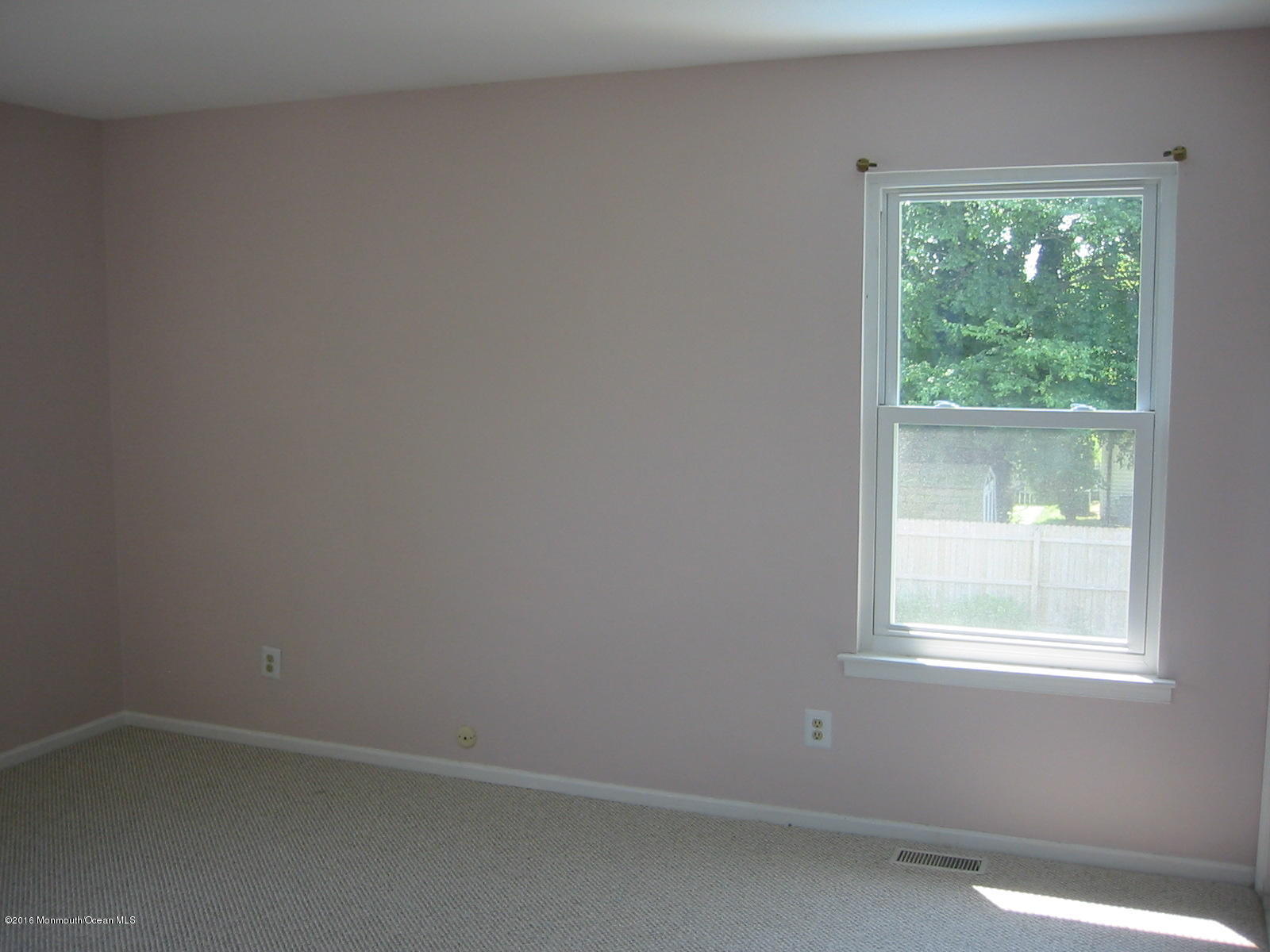 75 Appletree Road Howell, NJ 07731 - Photo 15 of 23 an empty room with a window