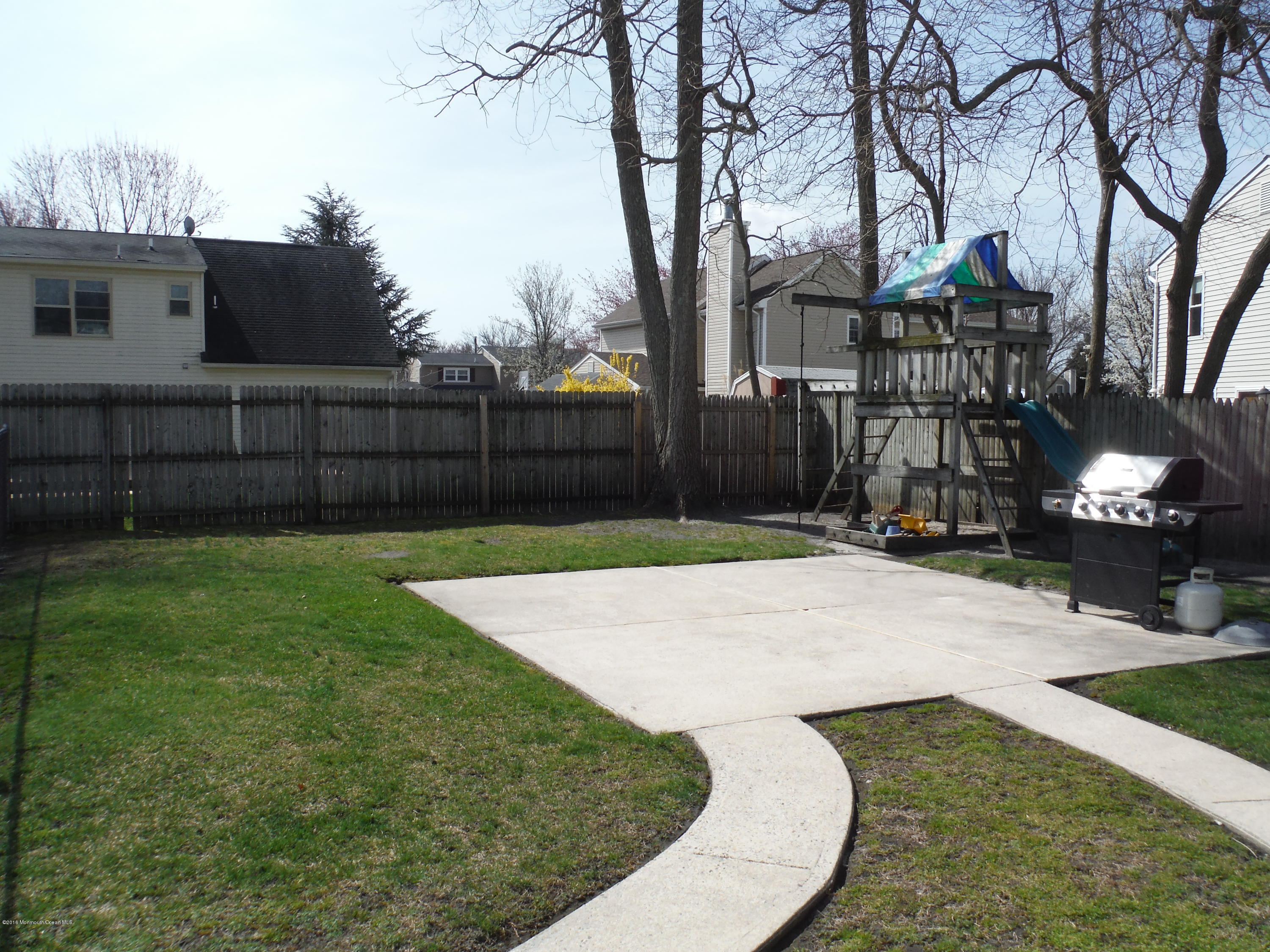75 Appletree Road Howell, NJ 07731 - Photo 20 of 23 a view of outdoor space yard deck and lake view