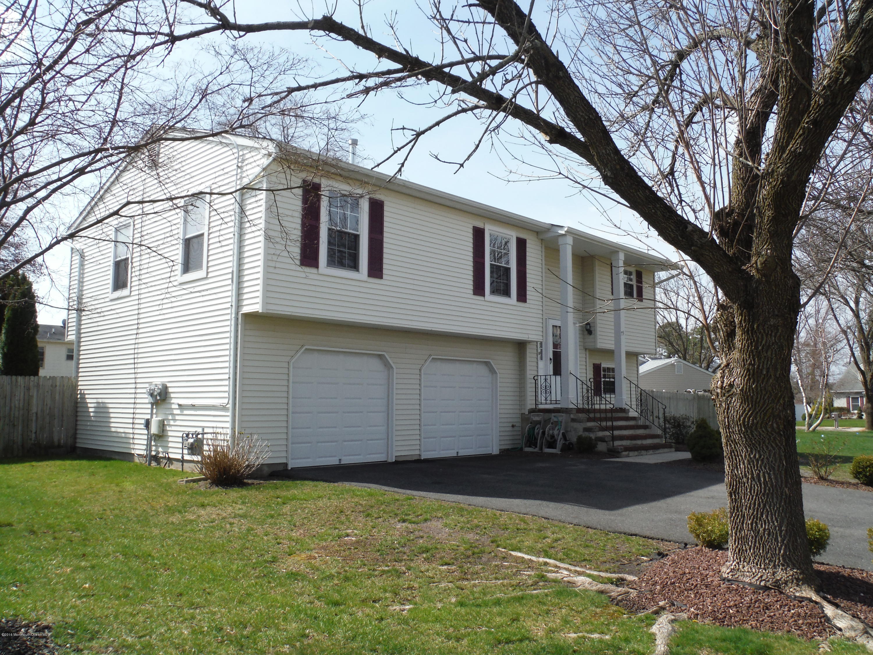 75 Appletree Road Howell, NJ 07731 - Photo 3 of 23 a house view with a garden space