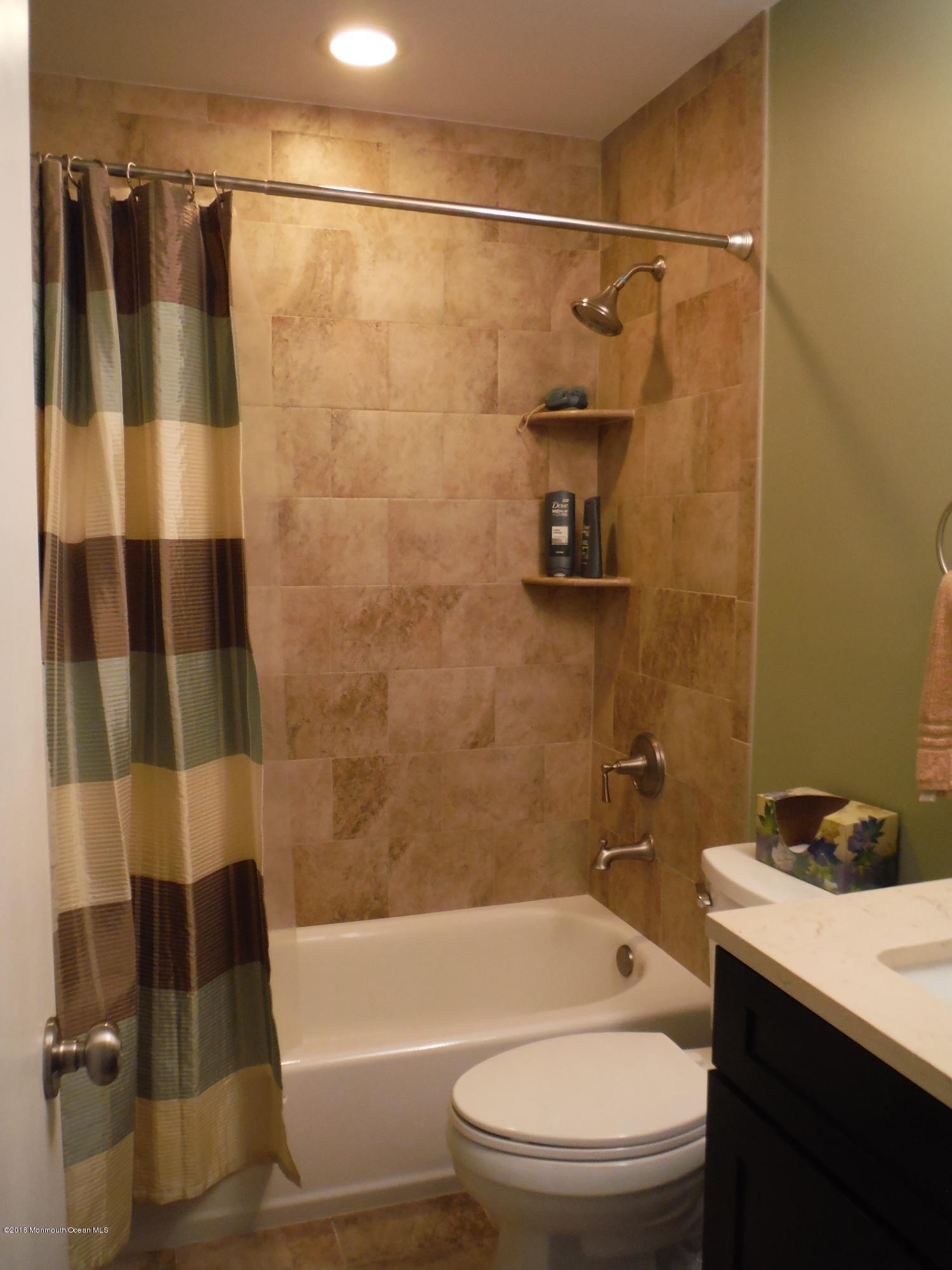 75 Appletree Road Howell, NJ 07731 - Photo 4 of 23 a bathroom with a granite countertop bathtub shower sink vanity and toilet