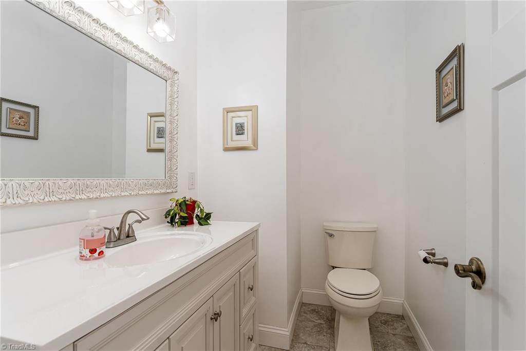 5518 Watchtower Road Julian, NC 27283 - Photo 17 of 50 Tiled half bath