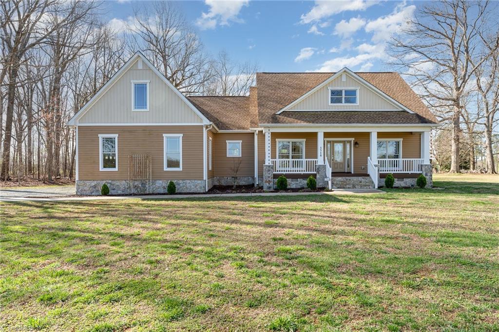 5518 Watchtower Road Julian, NC 27283 - Photo 47 of 50 Front porch overlooks serene views