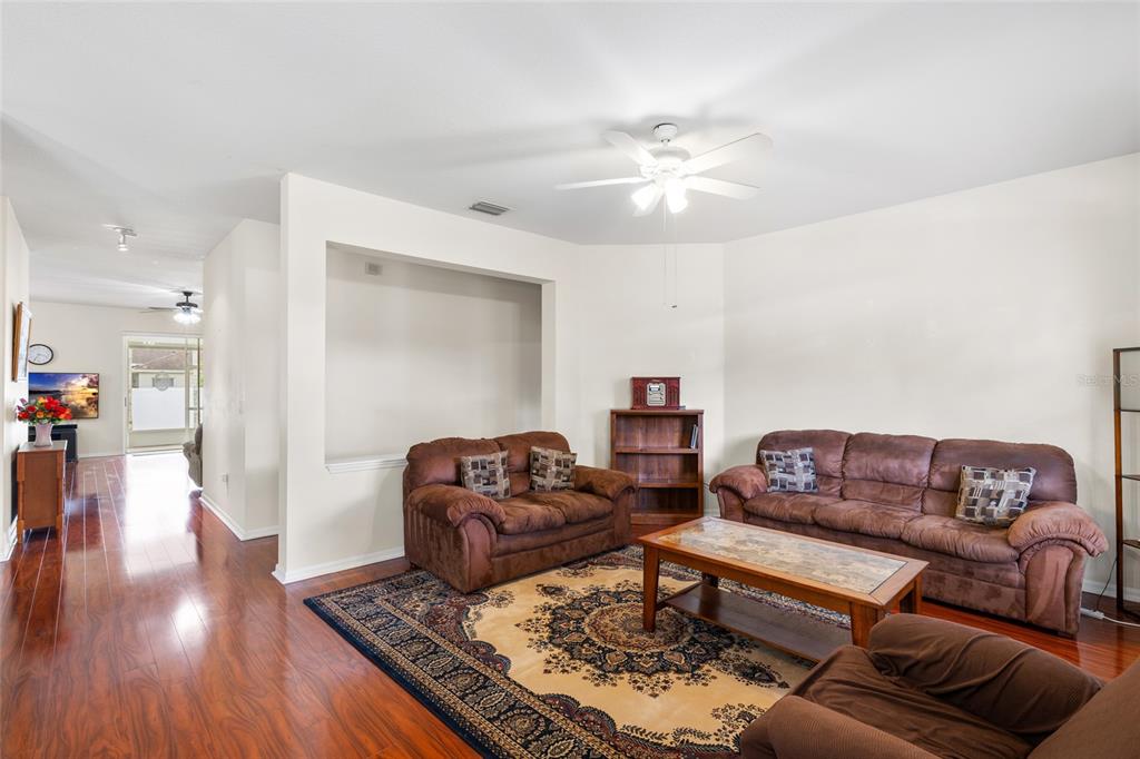 2763 Valencia Grove Drive Valrico, FL 33596 - Photo 6 of 38 a living room with furniture